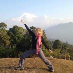 Yoga at Australia Base Camp to the backdrop of the snow capped Annapurna Ranges